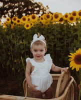 White Organic Cotton Ruffled Sleeve Romper with matching Headband