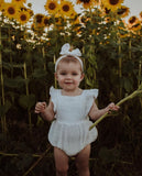 White Organic Cotton Ruffled Sleeve Romper with matching Headband