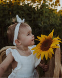 White Organic Cotton Ruffled Sleeve Romper with matching Headband